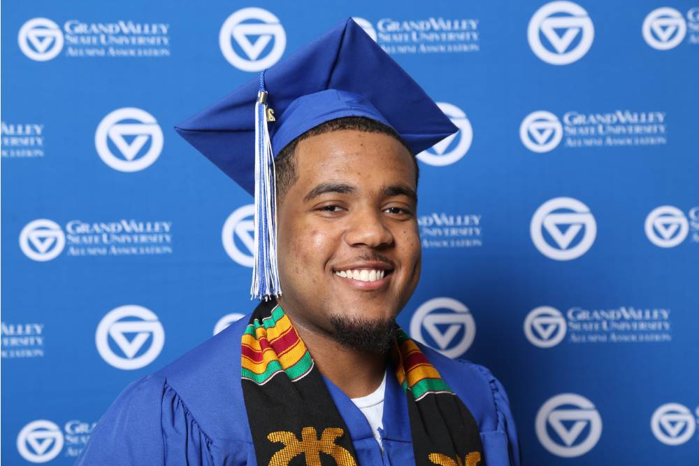 A future alumnus smiles for a pic